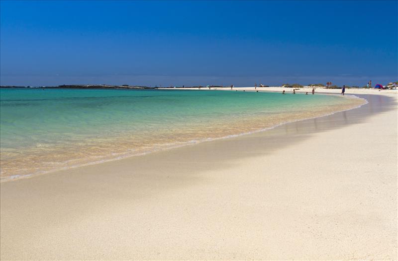 White sand beach and turquoise sea at El Cotillo Beach in Fuerteventura Island, Canarias.