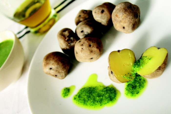 'Papas arrugadas' tiny volcanic ash grown potatoes in their jackets with green 'mojo' sauce.