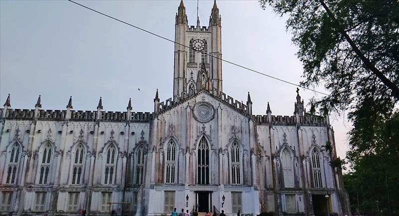 White Gothic façade of St. Paul's Cathedral in Kolkata, India.