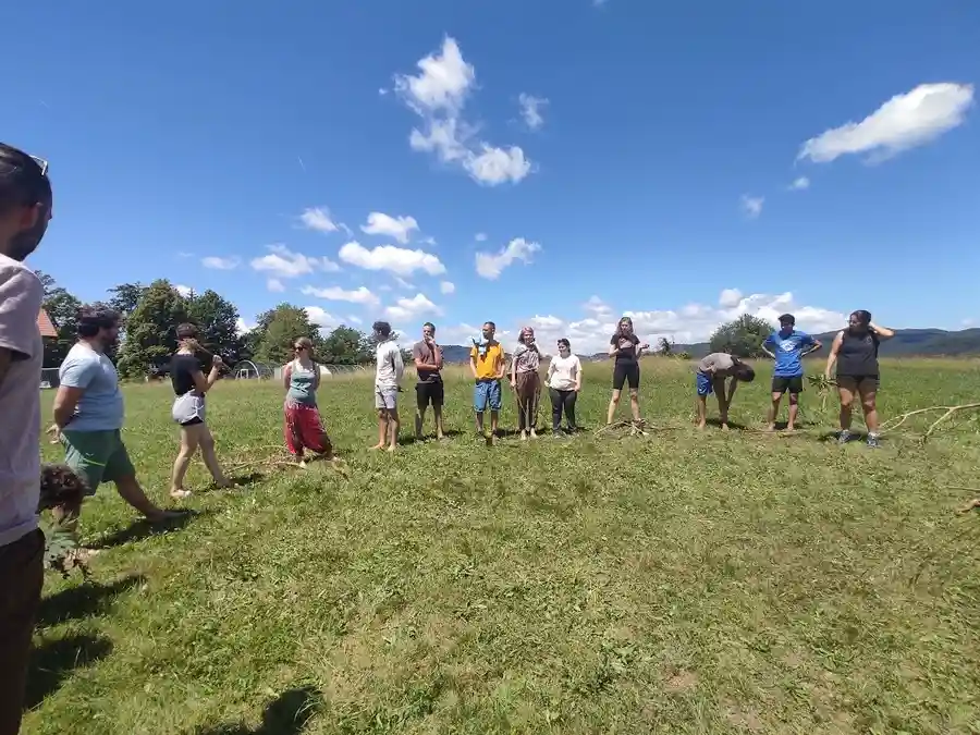 Volunteers in a field in Ponoviče, Slovenia.