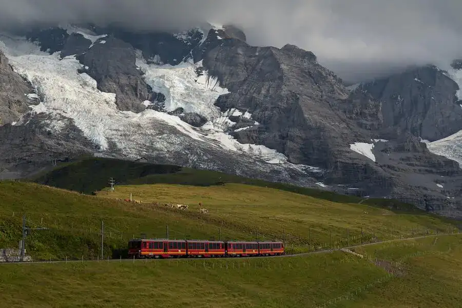 An example of sustainable tourism in Europe is travelling by train in Switzerland.