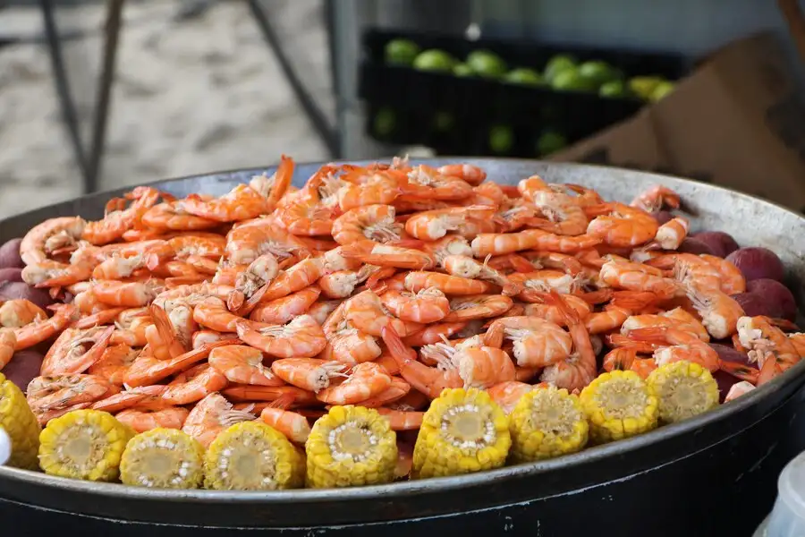 Large pan of Gulf Coast shrimps and corn at the festival.