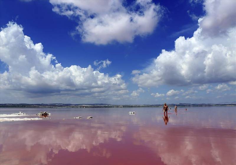 Pink lagoon salt waters of La Mata Torrevieja Lagoon, Costa Blanca in Spain.