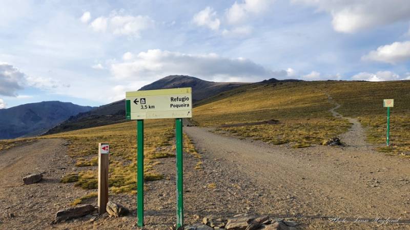 Signpost on barren trail between Mulhacen & the Mirador de Trevelez in Sierra Nevada.