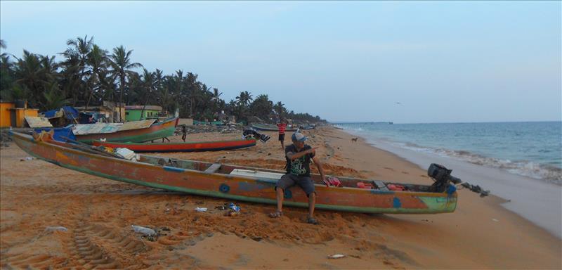 Trivandrum fishing canoe on Valiyathura beach in Kerala.