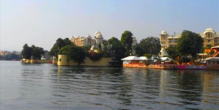 View of Udaipur City Palace across Picholi Lake.