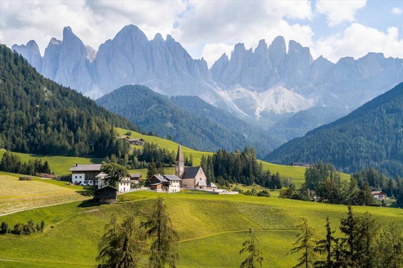 View of church in the valley 'Val di Funes' in the Italian Alps.
