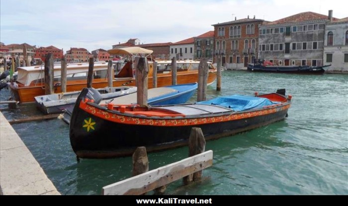 Gondola style boat on Canal Grande, Murano Island, Venice Lagoon