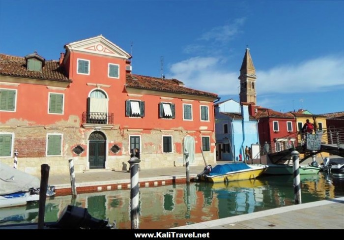 Mansion and church tower scene beside a canal on Burano Island, Venice Lagoon