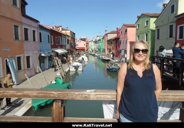 Canal view from Tre Ponte bridge on Burano Island, Venice Lagoon.