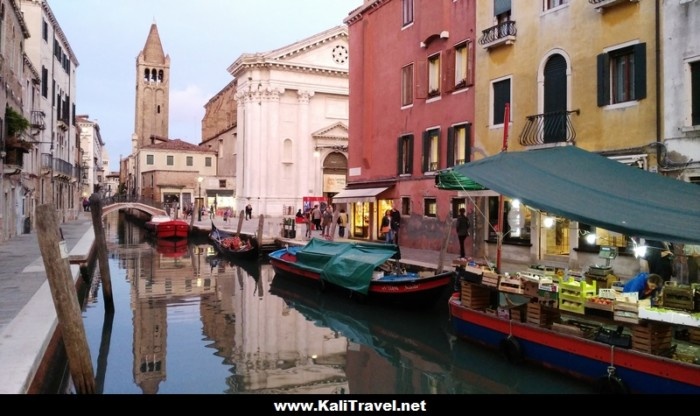 Boat selling fruit and vegetables on a Venice canal