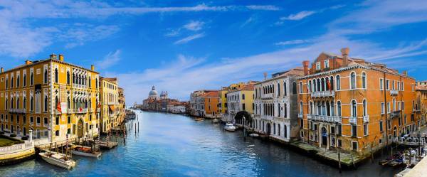 Colourful buidings by Venice Grand Canal.
