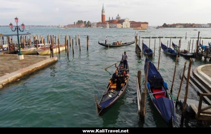 Gondolas on St Mark's waterfront canal in Venice, Italy