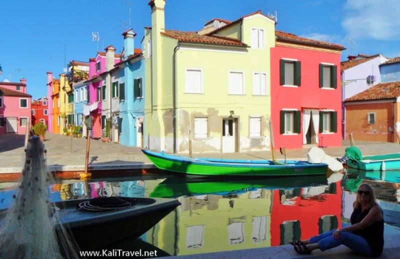 Colourful canal houses in Burano Island day trip from Venice in Italy.