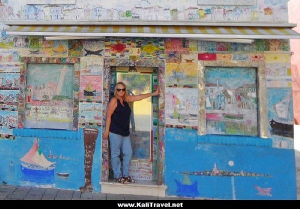 Street art on a shop front in Burano Island, Venice Lagoon