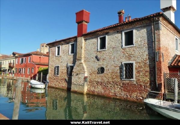 Ancient building by the canal on Torcello Island, Venice Lagoon