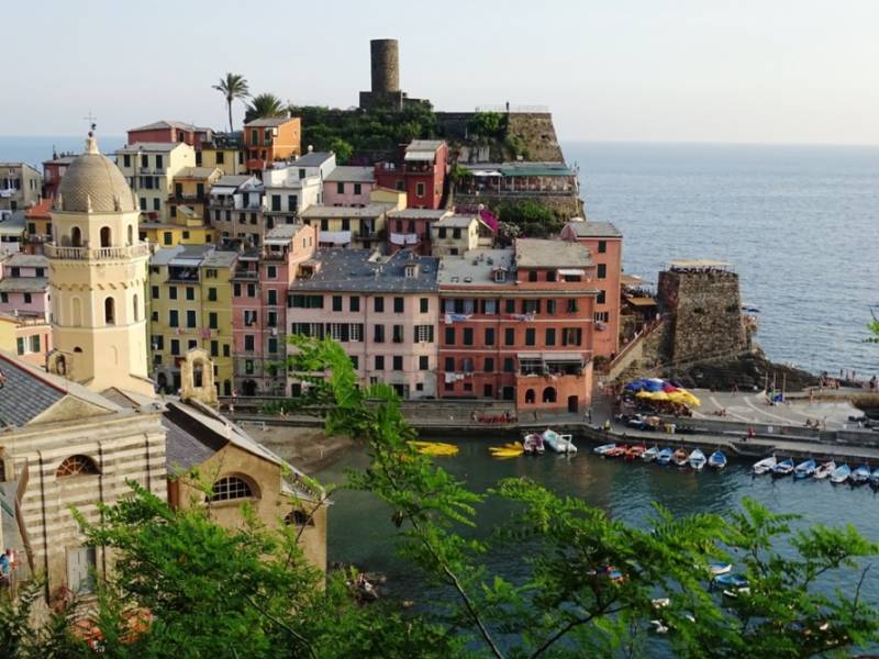 Colourful hillside village of Vernazza beside the Mediteranean Sea.