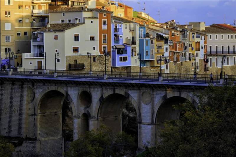 Roman bridge with colouful Villajoyosa old town in Costa Blanca.