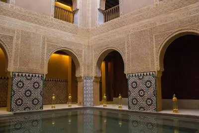 Visit Málaga's Hamman baths with Moorish style archways and decor.