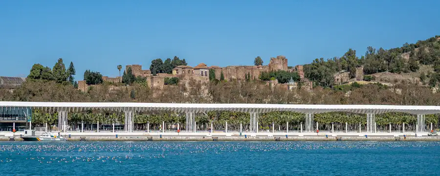 View over the sea of Málaga seafront and the Alcazaba Fortress.