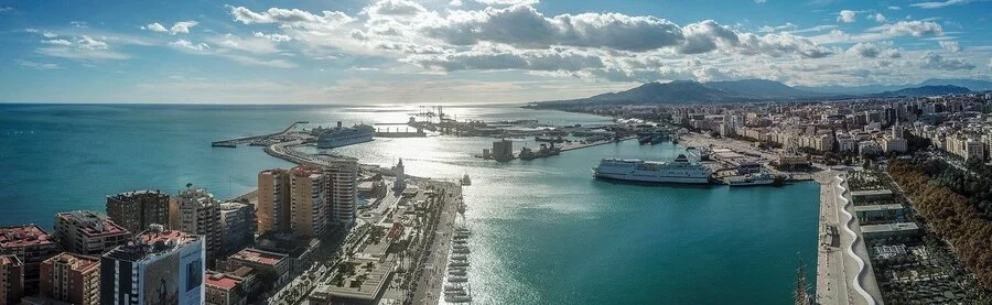 Panoramic view over the port and seafront on a visit to Málaga.