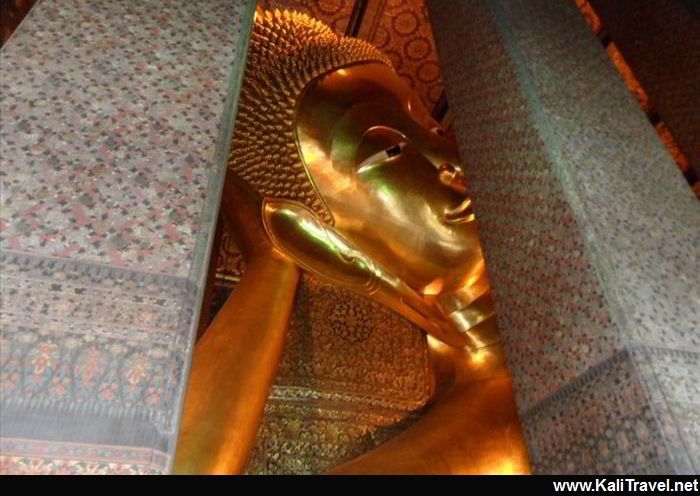 Wat Pho Temple in Bangkok: The huge golden Reclining Buddha.