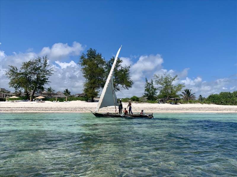 A dhow fishing boat sailing off Watamu Bay in Kenya.