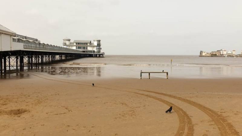 Weston-super-Mare sands and pier in Somerset, UK.