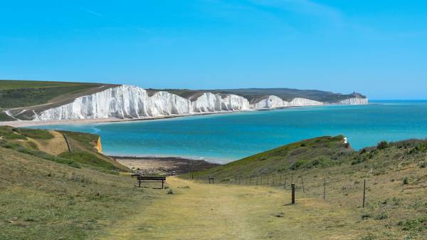 rack down to the sea with the 'Seven Sisters' white cliffs in the background. 