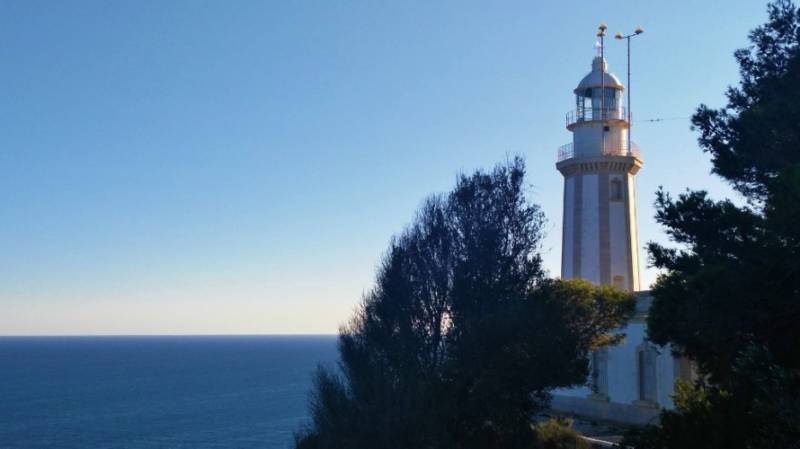 Cabo De La Nao Lighthouse by the cliffs in Jávea, Spain.